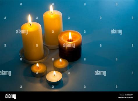 Lit up candles Stock Photo - Alamy