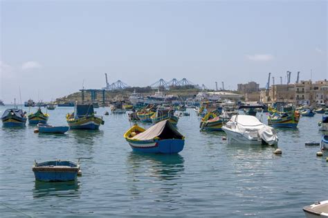 Luzzu Boats on Harbour, Marsaxlokk, Malta Stock Photo - Image of ...