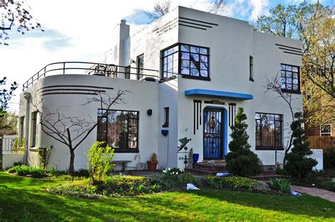 White with black trim details... popped with a deepest shade of light blue on the front door and ...