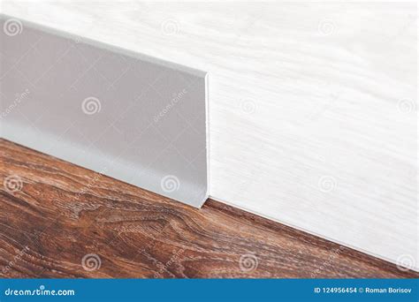 Installed Skirting on the a Wooden Wall Stock Photo - Image of architecture, apartment: 124956454