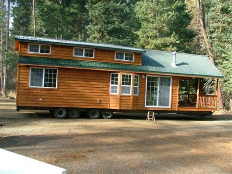 Spacious Cabin on Wheels with Large Windows - Tiny House Pins