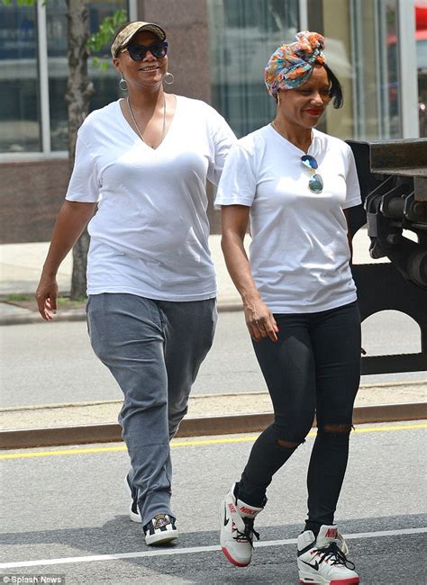 Queen Latifah and partner Eboni Nichols take a leisurely stroll in New ...