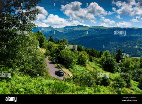 Sinuous road, Auvergne Volcanoes Regional Nature Park, Massif of Sancy, Puy de Dome, Auvergne ...