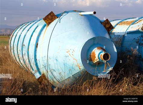 Old abandoned industry silos Stock Photo - Alamy