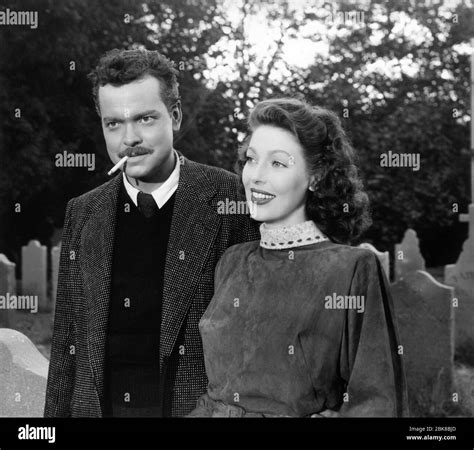 ORSON WELLES and LORETTA YOUNG on set location candid during filming of THE STRANGER 1946 ...