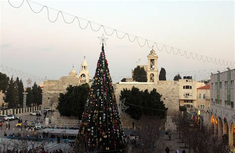 Christmas Tree In Manger Square Bethlehem Photograph by Munir Alawi