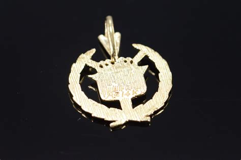 14K 1.5g Cadillac Emblem Car Yellow Gold Charm/Pendant | Property Room