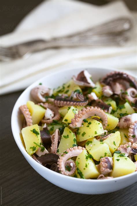 "Octopus Salad" by Stocksy Contributor "Davide Illini" - Stocksy