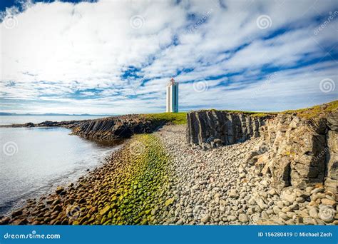 Lighthouse And Colorful Basalt Stones At Kalfshamarsvik On Iceland Royalty-Free Stock Photo ...