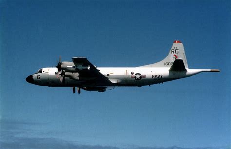 An air-to-air left side view of a P-3C Orion aircraft with an AGM-84A ...