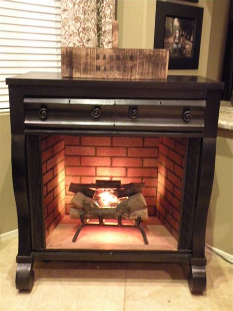 HOUSE UNDERCOVER: Old Dresser Turned Fireplace