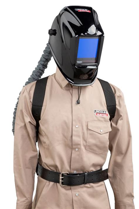 Welding helmet delivers filtered air into breathing zone