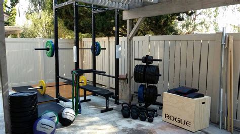 Outdoor home rogue fitness gym squat rack kettle bells | Backyard gym, Garage gym, Gym flooring