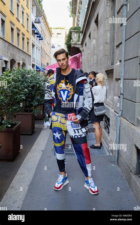 MILAN, ITALY - JUNE 15, 2019: Man with Versace outfit before Versace fashion show, Milan Fashion ...