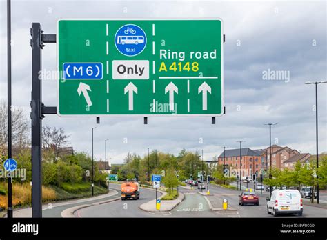 Overhead directional road sign for the M6 and A4148 ring road Stock Photo: 84459213 - Alamy