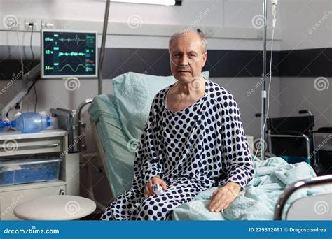 Portrait of Sad, Unwell Senior Man Sitting on the Edge of Hospital Bed Stock Image - Image of ...