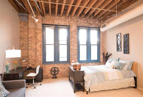 Exposed brick walls in bedroom of loft apartment for rent in Chicago ...