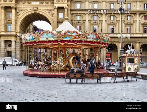 Florence, Tuscany, Italy. A merry-go-round (carousel) in Piazza della Stock Photo, Royalty Free ...