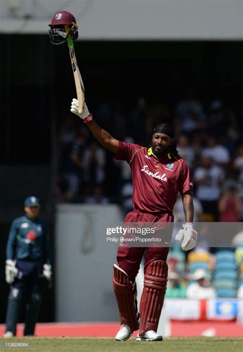 Chris Gayle of the West Indies celebrates reaching his century during ...