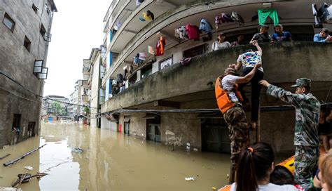 China Guangxi flooding leaves dozens dead and missing - CBS News