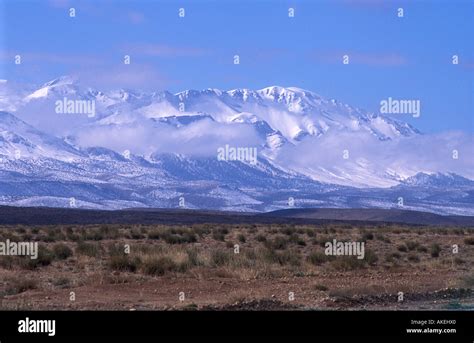 Snow on the High Atlas mountains seen from the N13 road which runs from ...