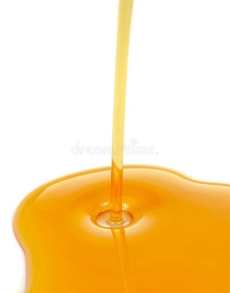 Stream Of Pouring Syrup On White Background Stock Photo - Image: 41906122