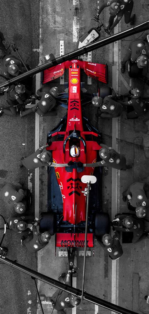 Download F1 Ferrari Pitstop Iphone Wallpaper | Wallpapers.com