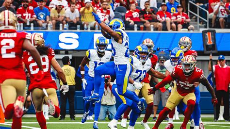 Los Angeles Rams running back Kyren Williams leaps into the end zone on ...