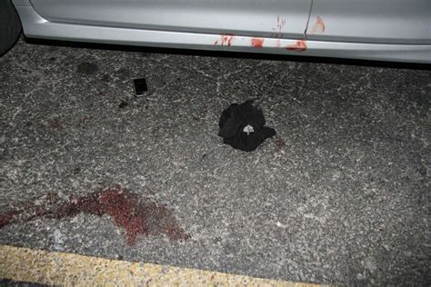 Graphic crime scene photos show aftermath of gun battle outside strip ...