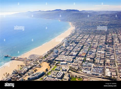 downtown Santa Monica Pier and beach with Santa Monica Mountains aerial ...