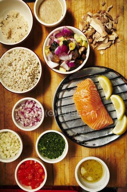 Smoked salmon with sides — background, lemons - Stock Photo | #147723635