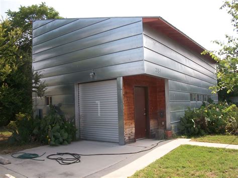 metal siding for exterior of house | This modern home with steel ...