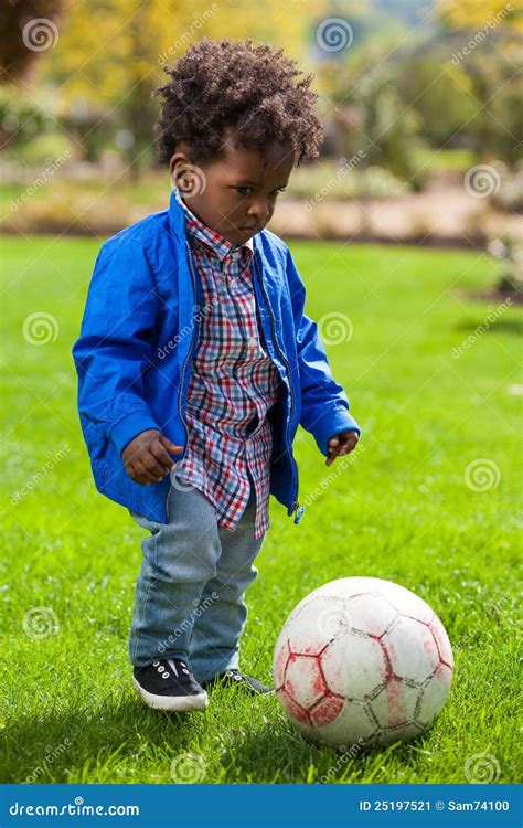 Outdoor Portrait Of A Black Baby Playing Soccer Stock Image - Image ...