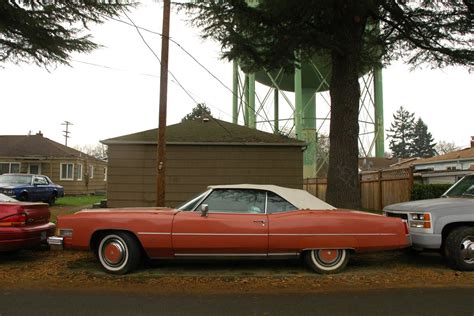 OLD PARKED CARS.: 1974 Cadillac Eldorado Convertible.