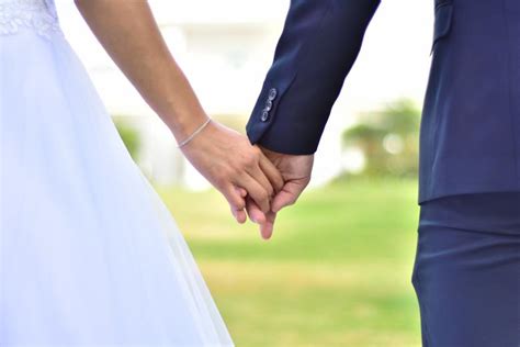 Couple Holding Hands in Wedding Ceremony - Free Stock Photo by Batu Berk on Stockvault.net