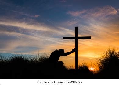 Kneeling At The Cross Wallpaper