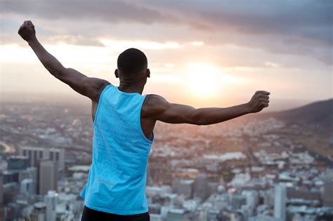 Free Photo | Carefree independent man with dark skin, stands back ...