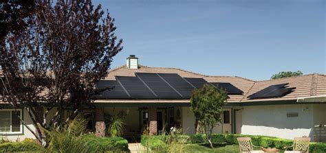 black-solar-panels-on-brown-roof-2850347 - K & P Exteriors