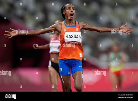 Sifan Hassan, of Netherlands, reacts as she crosses the finish line to ...