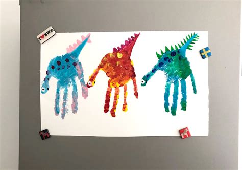 Handprint dinosaur finger painting DIY craft