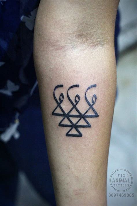 Saraswati symbol Tattoo, by TattooArtist Sachin at Being animal tattoos ...