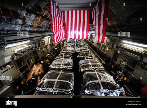 Pallets of cargo inside of a C-17 Globemaster III before conducting air delivery operations over ...