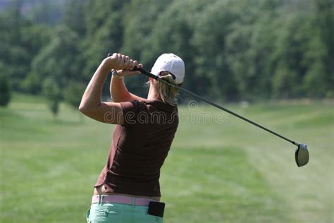 Lady golf swing stock photo. Image of hitting, putt, green - 2508262