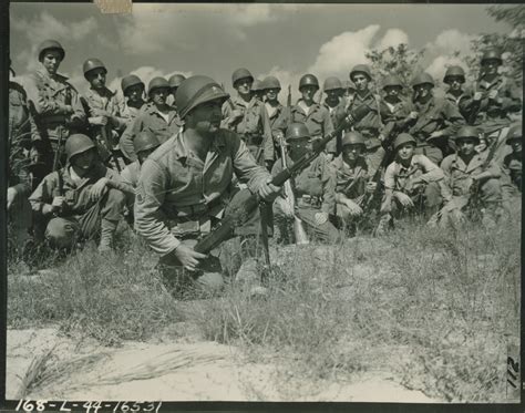 Sergeant Abdella of the 71st Infantry Division demonstrates how to fire ...