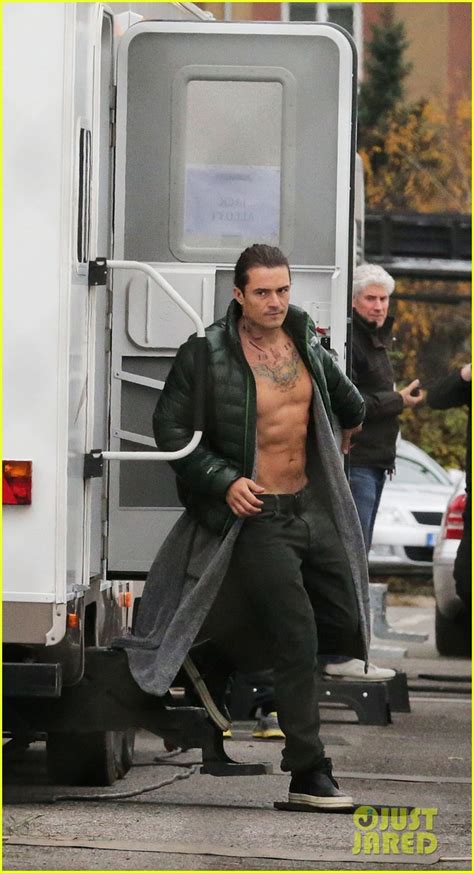 Orlando Bloom Gets Shirtless with Fake Tattoos for 'Unlocked': Photo 3247354 | Orlando Bloom ...