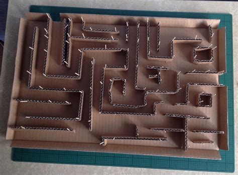 A cardboard marble maze in process of construction. Will finish it ...