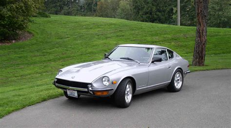 1970 Datsun 240Z vs 1969 Toyota 2000GT – Gold Eagle