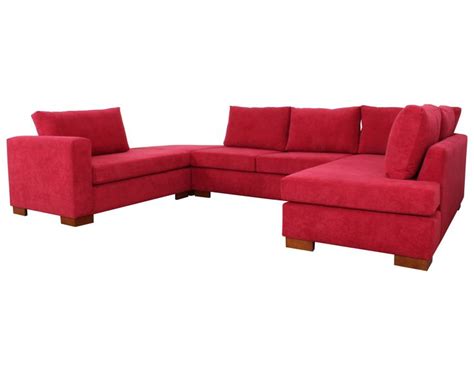 a red sectional couch sitting on top of a white floor