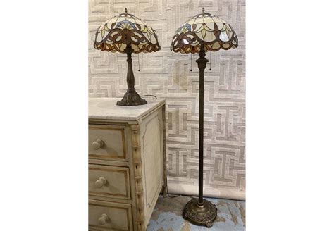 TIFFANY STYLE FLOOR LAMP, 150cm H, together with a matching Tiffany style table lamp, 60cm H. (2)