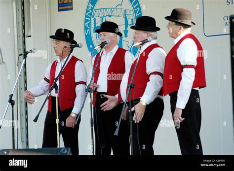 Barbershop quartet perform by singing songs on a stage Stock Photo - Alamy